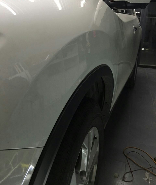 汽車前翼子板凹陷修復后